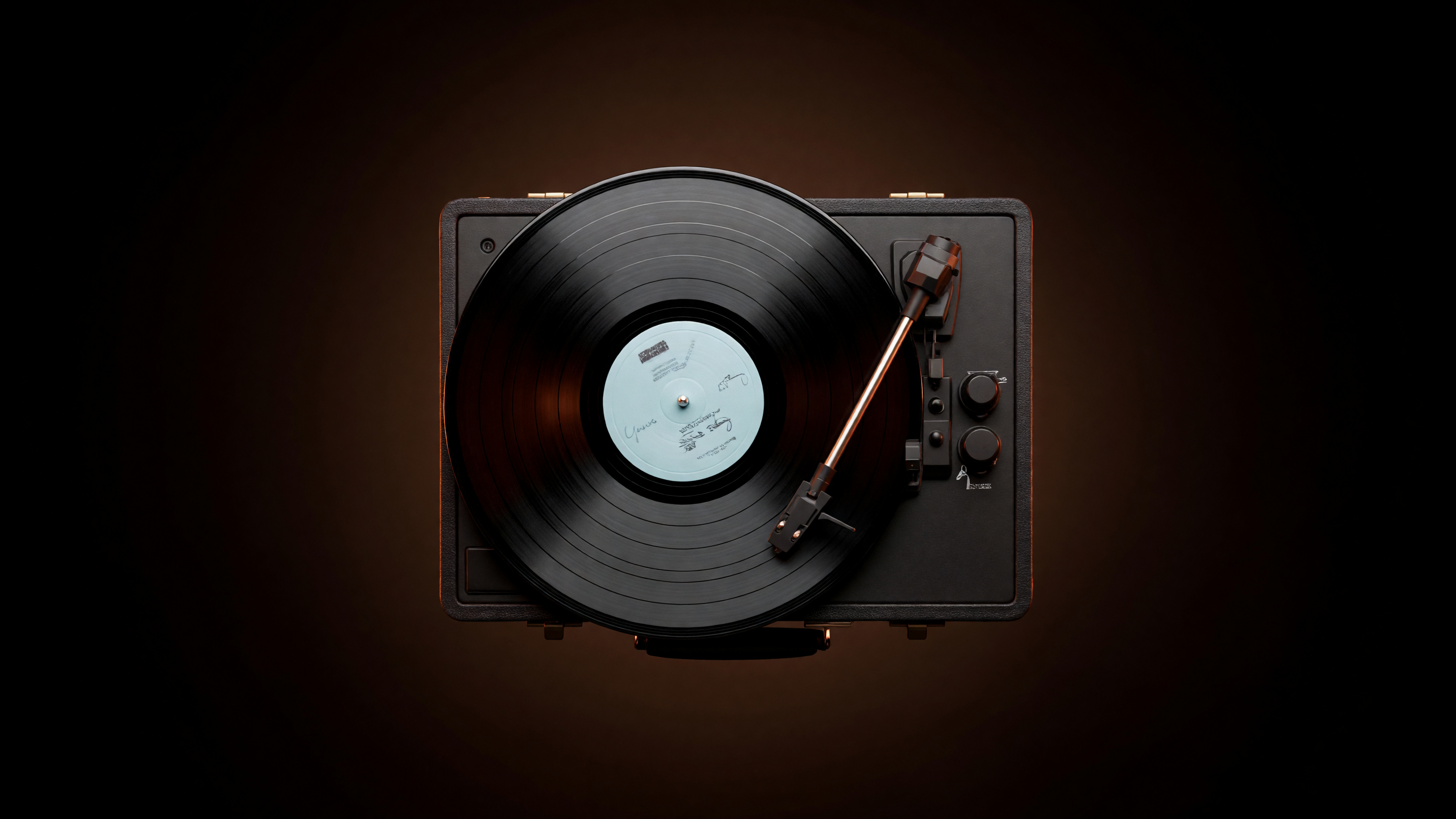 Top-down view of the Revolve turntable with a record spinning